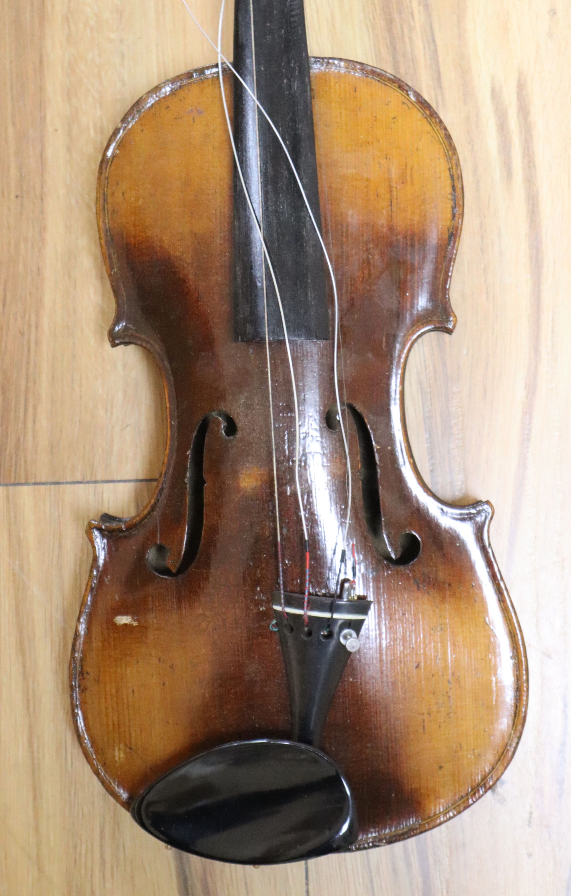 A violin labelled W Placht & Co, 58cm, cased